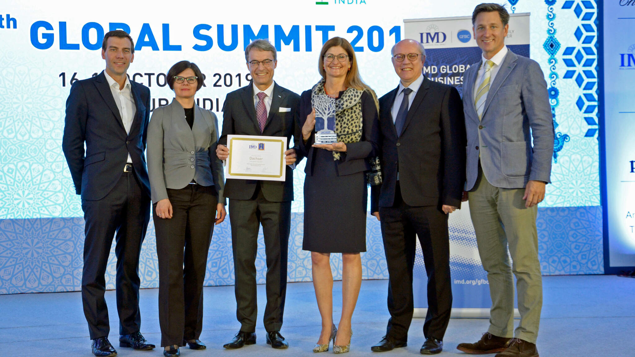 Prof. Peter Vogel, Director of IMD Global Family Business Center; Marta Widz, IMD Research Fellow; Bernhard Simon, CEO DACHSER SE; Birgit Kastner-Simon, Corporate Director Corporate Marketing, DACHSER SE; Prof. Benoit Leleux, IMD Global Family Business Award Director; Matthew Crudgington, Associate Director, IMD Global Family Business Centeramily Business Award